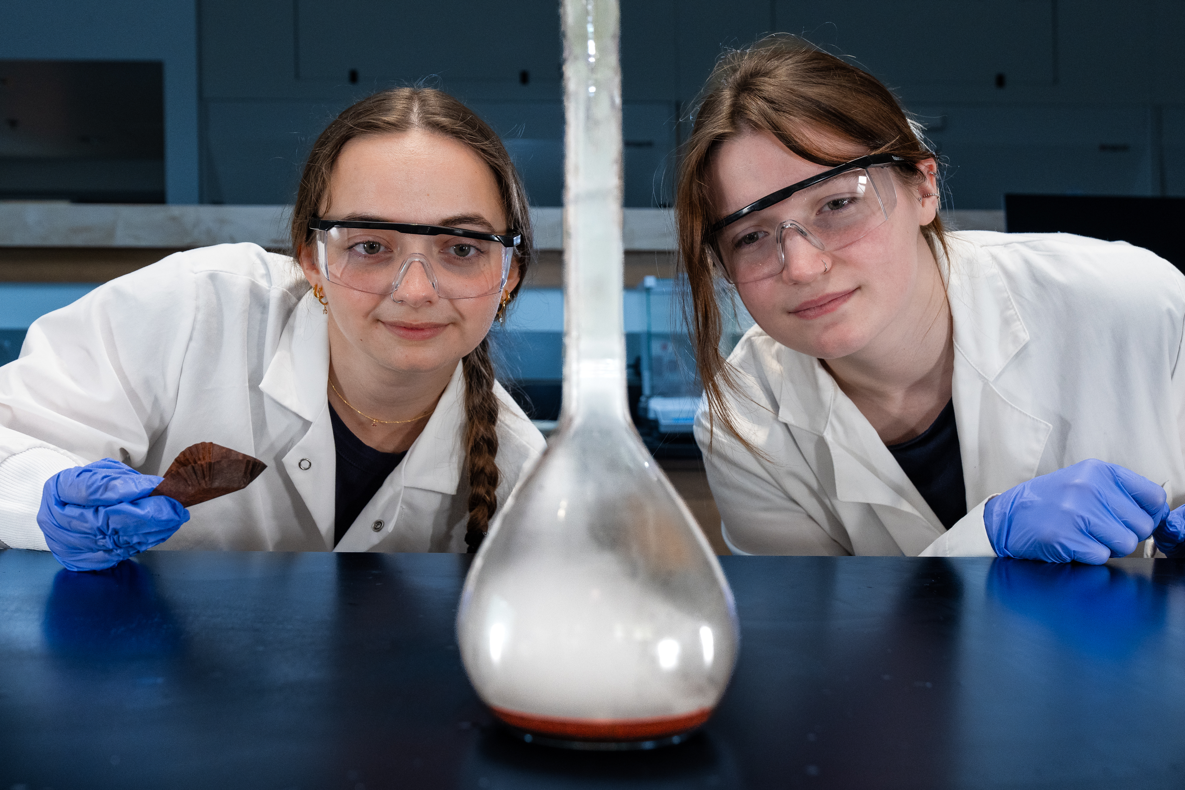 CHEM 316 students wait for chemical reaction