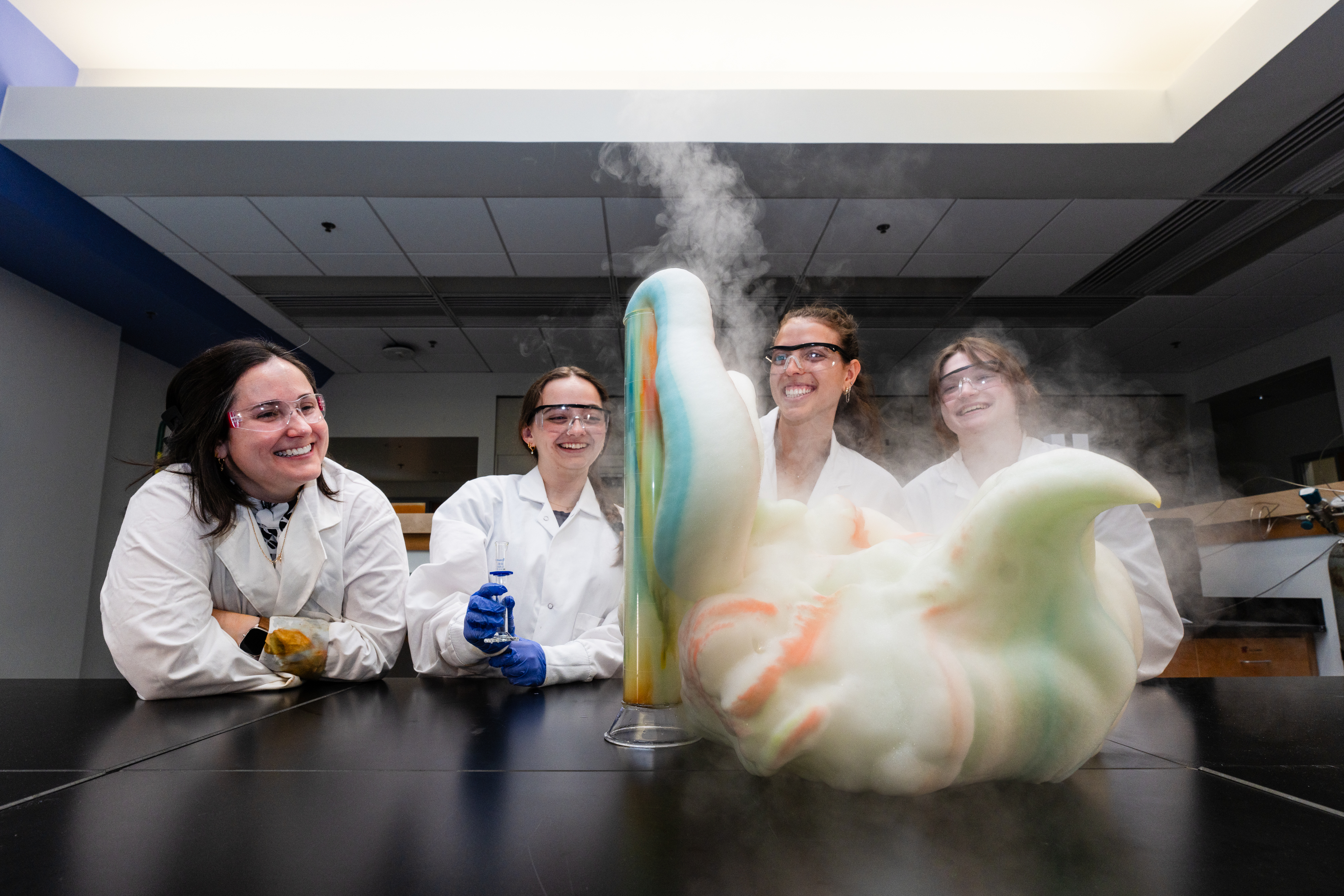 CHEM 316 students observe overflow of concoction and steam