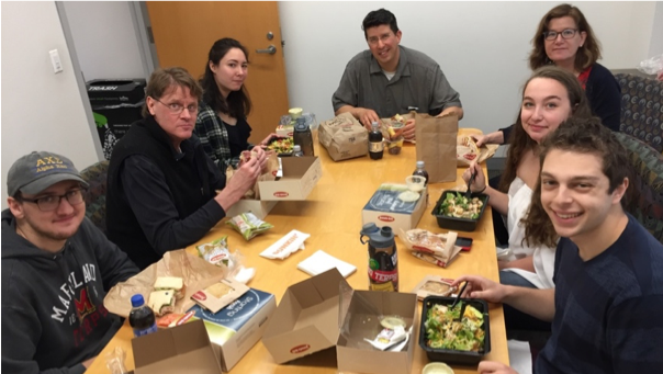 Tom Flores having lunch with undergraduate students in the Alpha Chi Sigma professional chemistry fraternity
