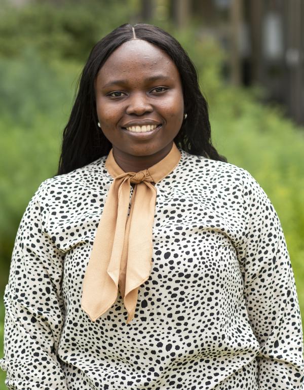 image of Esther Olonimoyo smiling 