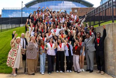 Senior marshals standing on steps