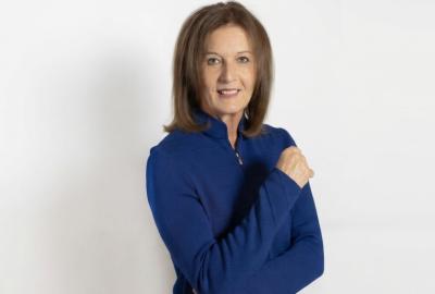 Krisztina Zsebo in a blue jacket