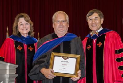 Jeffery Davis receiving his award