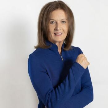 Krisztina Zsebo in a blue jacket