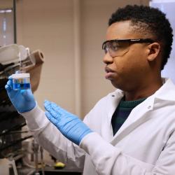Hakeem Henry working in a lab.